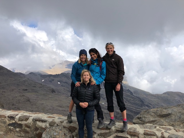 Anisha and friends taking on a challenge climbing in Spain after her diagnosis