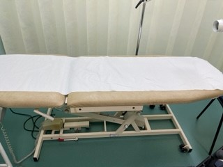 Bed used in GP surgery for smear test